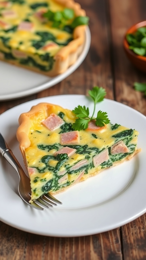 A slice of ham and spinach quiche on a plate, garnished with parsley, alongside a bowl of mixed greens.